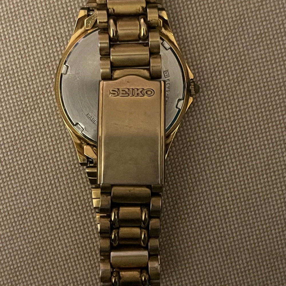 Men’s gold Seiko watch